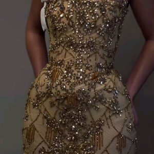 Robe doré avec broderie à louer